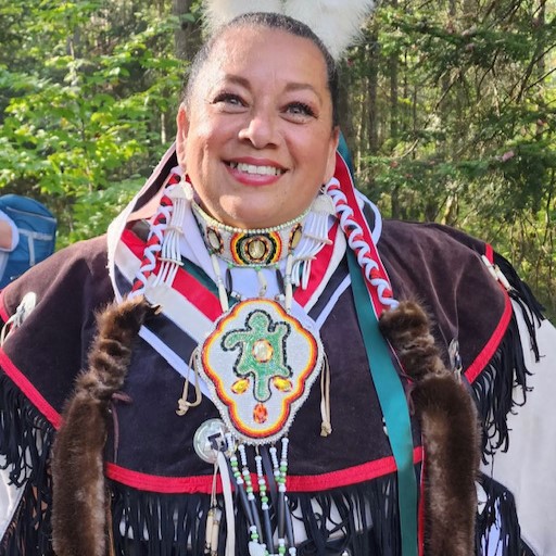 Kim's headshot in traditional clothes